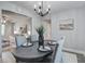Charming dining room that connects to the living room, featuring a dark wood table at 137 Ashton Dr, Goose Creek, SC 29445
