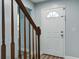Inviting entryway showcasing wood floors, modern lighting, and a freshly painted front door at 137 Ashton Dr, Goose Creek, SC 29445