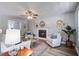 Bright living room featuring a fireplace, ceiling fan, and stylish decor at 137 Ashton Dr, Goose Creek, SC 29445