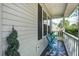 Cozy porch features a small table with two chairs, offering a relaxing outdoor space at 137 Ashton Dr, Goose Creek, SC 29445