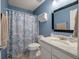 Cozy bathroom features a shower, vanity, and decorative mirror at 1414 E Crossing Ln, Mount Pleasant, SC 29466