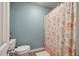 Bathroom features neutral walls and patterned shower curtain at 1414 E Crossing Ln, Mount Pleasant, SC 29466