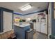 Charming kitchen with a central island, white cabinets, stainless steel appliances, and modern finishes at 1414 E Crossing Ln, Mount Pleasant, SC 29466