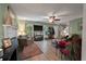 Bright living room featuring a fireplace, comfortable seating, hardwood floors, and lots of natural light at 1414 E Crossing Ln, Mount Pleasant, SC 29466