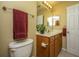 Cozy bathroom features a wood vanity, framed mirror and tiled flooring at 149 Darcy Ave, Goose Creek, SC 29445