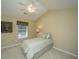 Bedroom with neutral colors and carpet, ceiling fan and a window with natural light at 149 Darcy Ave, Goose Creek, SC 29445