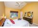 Bright bedroom with vaulted ceilings, fan, dresser and window with natural light at 149 Darcy Ave, Goose Creek, SC 29445