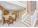 Spacious entryway with dining area, staircase with chairlift, leading into an open floor plan at 149 Darcy Ave, Goose Creek, SC 29445
