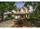 Charming two-story home with a manicured lawn and inviting front entrance, complemented by lush trees at 149 Darcy Ave, Goose Creek, SC 29445