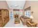 Cozy living room features a fireplace, ceiling fan, and sliding door to a patio area at 149 Darcy Ave, Goose Creek, SC 29445