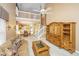 Bright living room with sofa, entertainment center, overlooking the dining and kitchen area at 149 Darcy Ave, Goose Creek, SC 29445