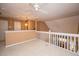 Spacious upstairs loft featuring a ceiling fan, neutral carpet, stairs and natural light at 149 Darcy Ave, Goose Creek, SC 29445