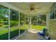 Inviting screened porch offering refreshing views of the well maintained backyard at 149 Darcy Ave, Goose Creek, SC 29445