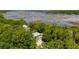 Aerial view of the house showcasing beautiful water and marsh views at 1510 Old Rosebud Trl, Awendaw, SC 29429