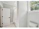 Classic bathroom with subway tile shower, a window, and updated fixtures for a clean, modern look at 1510 Old Rosebud Trl, Awendaw, SC 29429
