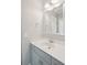 Bathroom featuring a white countertop vanity, with a decorative mirror and bright overhead lighting at 1510 Old Rosebud Trl, Awendaw, SC 29429