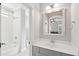 Well-lit bathroom with modern vanity, a shower-tub combo, and contemporary fixtures at 1510 Old Rosebud Trl, Awendaw, SC 29429