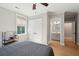 Inviting bedroom with ample closet space and a bright ensuite bathroom, perfect for relaxation at 1510 Old Rosebud Trl, Awendaw, SC 29429