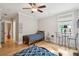 Lovely bedroom with a view to an adjacent room and 2 beds, creating a warm and welcoming space at 1510 Old Rosebud Trl, Awendaw, SC 29429