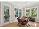 Inviting breakfast nook with large windows offering scenic views and ample natural light at 1510 Old Rosebud Trl, Awendaw, SC 29429