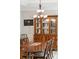 Formal dining room featuring a wood table, chairs, china cabinet and chandelier at 1510 Old Rosebud Trl, Awendaw, SC 29429