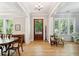 Open foyer with wood floors, windows, and ample lighting at 1510 Old Rosebud Trl, Awendaw, SC 29429