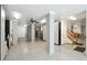 Large garage with high ceilings, recessed lighting, custom storage, and epoxy flooring at 1510 Old Rosebud Trl, Awendaw, SC 29429