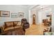 Open living room with wood floors, comfortable furnishings and decor at 1510 Old Rosebud Trl, Awendaw, SC 29429