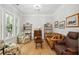 Comfortable living room with hardwood floors, classic furniture, and lots of natural light at 1510 Old Rosebud Trl, Awendaw, SC 29429