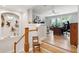 View of living room from the stairs with hardwood floors and staircase at 1510 Old Rosebud Trl, Awendaw, SC 29429