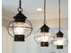 Stylish pendant lights hanging above a kitchen island, adding a touch of elegance to the space at 1510 Old Rosebud Trl, Awendaw, SC 29429
