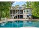 Backyard pool and patio area is ideal for outdoor entertainment and relaxation at 1510 Old Rosebud Trl, Awendaw, SC 29429