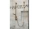 Close up of the handheld shower fixture in the tiled shower at 1510 Old Rosebud Trl, Awendaw, SC 29429