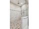 Modern walk-in shower featuring stunning tile work, a glass partition, and a rainfall showerhead at 1510 Old Rosebud Trl, Awendaw, SC 29429