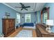 Bedroom featuring hardwood floors, a ceiling fan, and a window that offers natural light at 1512 Eagle Landing Blvd, Hanahan, SC 29410