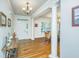 Welcoming foyer featuring hardwood floors, elegant columns, and abundant natural light at 1512 Eagle Landing Blvd, Hanahan, SC 29410