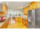 Bright kitchen featuring stainless steel appliances and ample wood cabinets at 1512 Eagle Landing Blvd, Hanahan, SC 29410