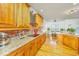 Gourmet kitchen with granite countertops, stainless steel appliances, brick accents at 1512 Eagle Landing Blvd, Hanahan, SC 29410