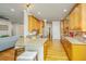Kitchen with granite countertops, wood cabinets, island with seating at 1512 Eagle Landing Blvd, Hanahan, SC 29410