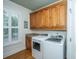 Laundry room featuring newer appliances, storage, and natural light at 1512 Eagle Landing Blvd, Hanahan, SC 29410