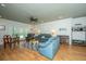 Inviting living room with hardwood floors, ceiling fan, and plenty of seating for entertaining at 1512 Eagle Landing Blvd, Hanahan, SC 29410