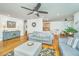 Bright living room with hardwood floors, neutral colors, and ceiling fan at 1512 Eagle Landing Blvd, Hanahan, SC 29410