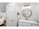 Bathroom featuring a white vanity with a white door leading to the connected bedroom at 153 High Hammock Villas, Seabrook Island, SC 29455