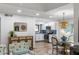 Cozy dining area with stylish lighting fixtures and open access to the kitchen at 153 High Hammock Villas, Seabrook Island, SC 29455