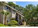 Multi-story home featuring balconies and lush green landscape at 153 High Hammock Villas, Seabrook Island, SC 29455