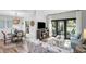 Inviting living area with sliding doors, comfortable seating, and modern decor at 153 High Hammock Villas, Seabrook Island, SC 29455
