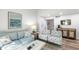 Comfortable living room featuring a sofa, chairs, and stylish decor with plenty of natural light at 153 High Hammock Villas, Seabrook Island, SC 29455