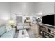 Open-concept living room flows into the kitchen, complete with comfortable seating and modern decor at 153 High Hammock Villas, Seabrook Island, SC 29455
