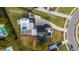 Expansive aerial view showcasing a luxury home with a pool, outdoor living space, and meticulous landscaping in a desirable neighborhood at 1537 Tomato Farm Cir, Mount Pleasant, SC 29464