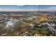 Sweeping aerial shot of the stunning coast with marshland landscape and nearby neighborhood at 1537 Tomato Farm Cir, Mount Pleasant, SC 29464